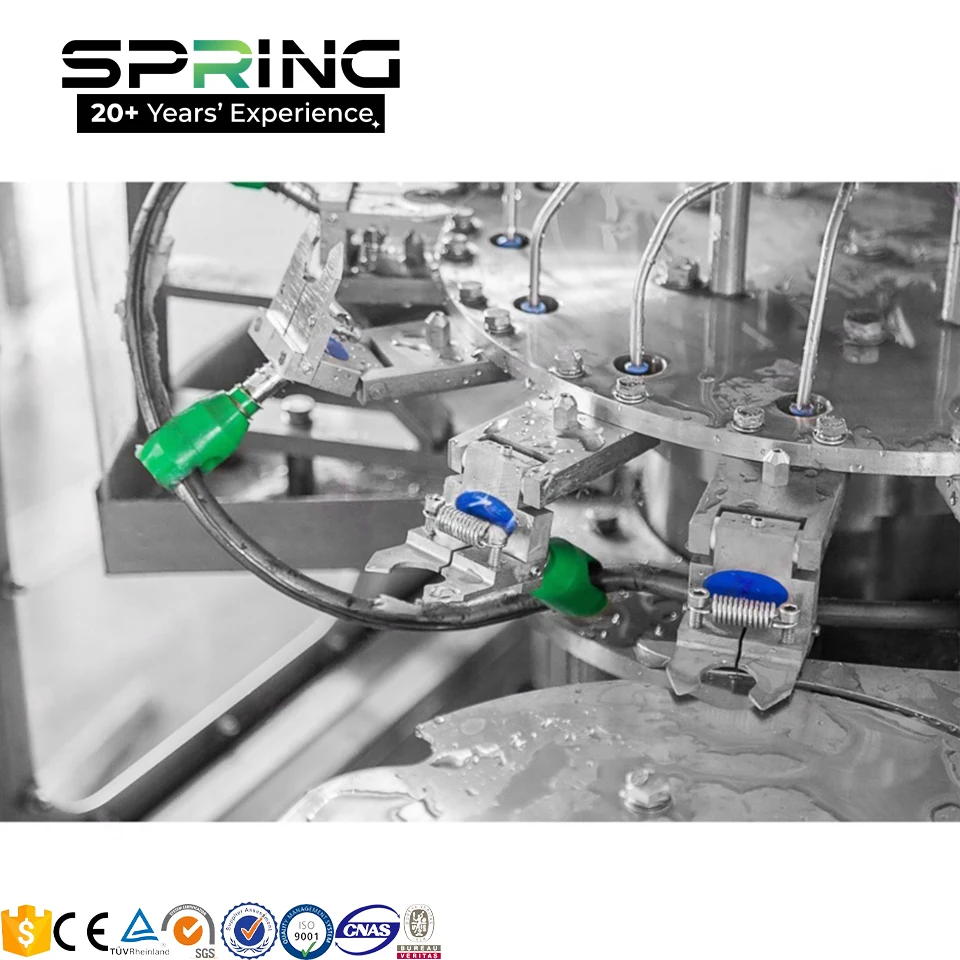 Top view of the rinsing filling and capping monoblock for 4000BPH bottled water line 缩略图